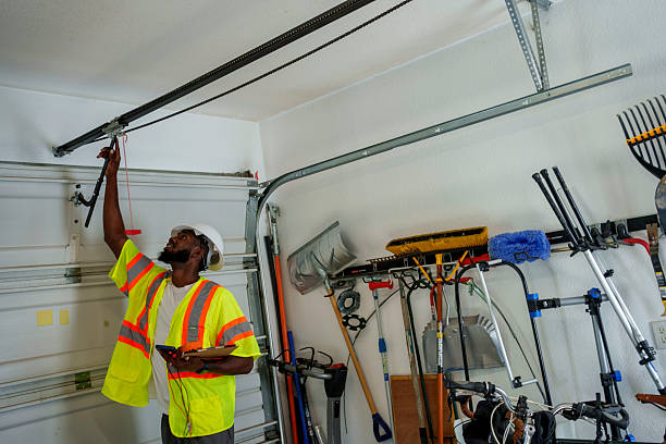 Professional Garage Door Panel Replacement technician working in Helena, AL